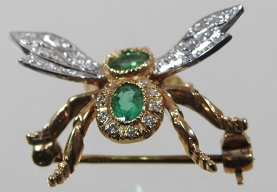 Lot 45 - A 9 carat gold, emerald and diamond brooch, in...