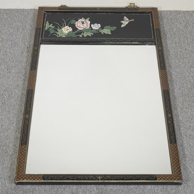 Lot 503 - A Chinese ebonised wall mirror, 20th century,...