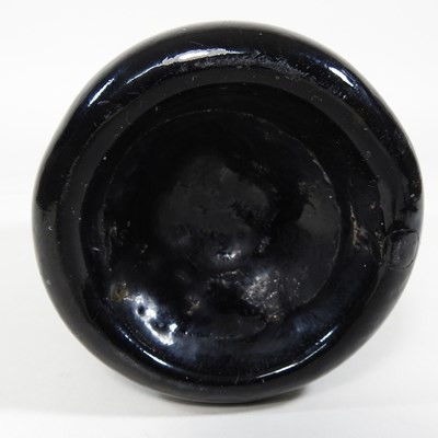 Lot 15 - An 18th century English brown glass sealed...