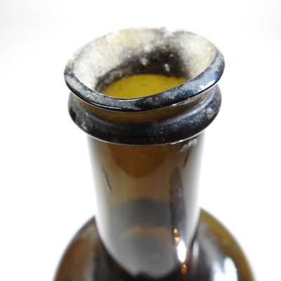 Lot 15 - An 18th century English brown glass sealed...