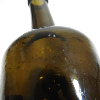 Lot 15 - An 18th century English brown glass sealed...