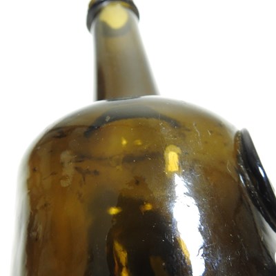 Lot 15 - An 18th century English brown glass sealed...