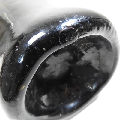 Lot 15 - An 18th century English brown glass sealed...