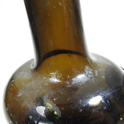 Lot 15 - An 18th century English brown glass sealed...