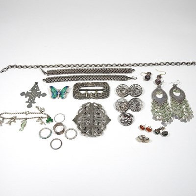 Lot 68 - An early 20th century silver buckle, together...