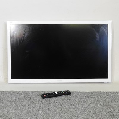Lot 465 - A white Samsung 31 inch television, with...