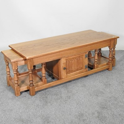 Lot 514 - A light oak coffee table, together with two...