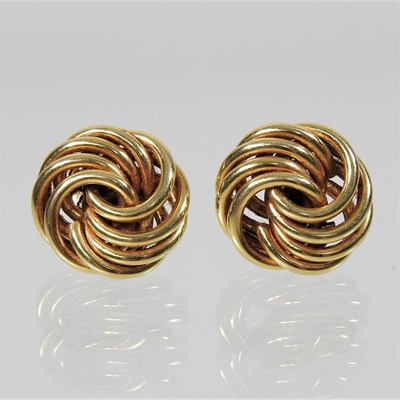 Lot 174 - A pair of 18 carat gold earrings