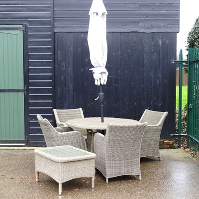 Lot 51 - A rattan garden suite to include a circular...