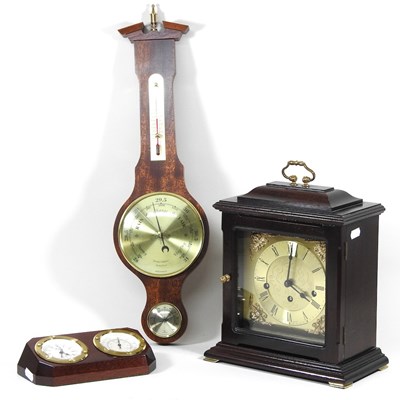 Lot 472 - A modern bracket clock, 32cm high, together...