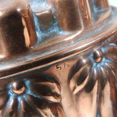Lot 8 - A Victorian copper jelly mould, stamped H. L....
