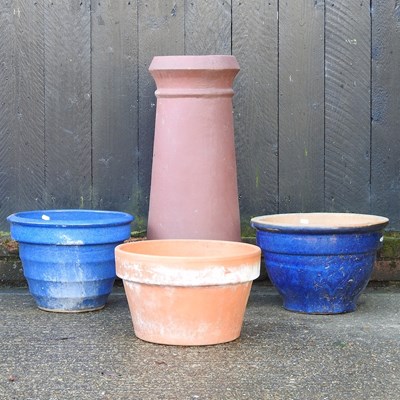 Lot 38 - A terracotta chimney pot, 75cm high, together...