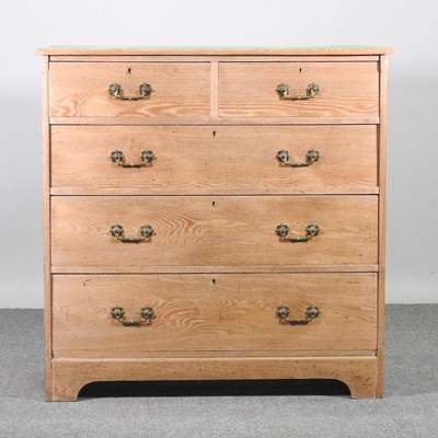 Lot 519 - An Edwardian light ash chest of drawers