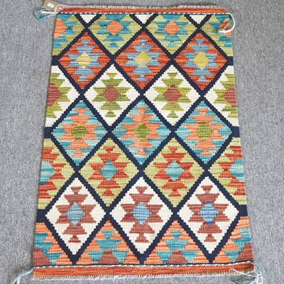 Lot 563 - A kelim rug, with all over hooked diamonds, 90...