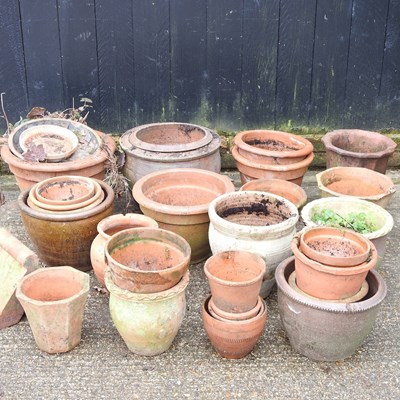 Lot 521 - A collection of mainly terracotta garden pots,...