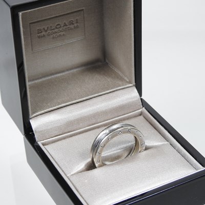 Lot 23 - A Bulgari 18 carat white gold ring, of plain...