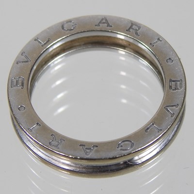 Lot 23 - A Bulgari 18 carat white gold ring, of plain...