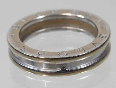 Lot 23 - A Bulgari 18 carat white gold ring, of plain...