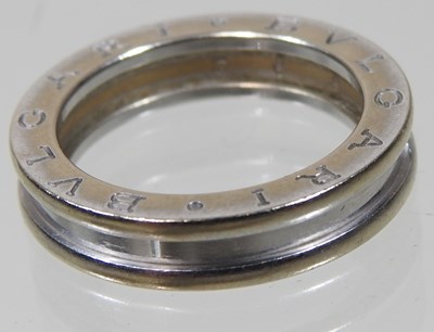 Lot 23 - A Bulgari 18 carat white gold ring, of plain...