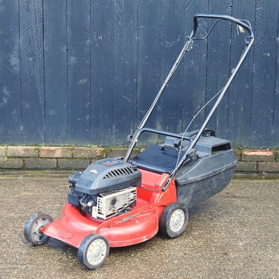 Lot 106 - A Quatro red petrol lawnmower
