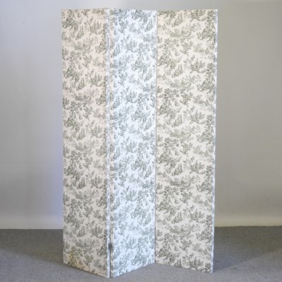 Lot 553 - A three-fold screen, printed in green, 135 x...