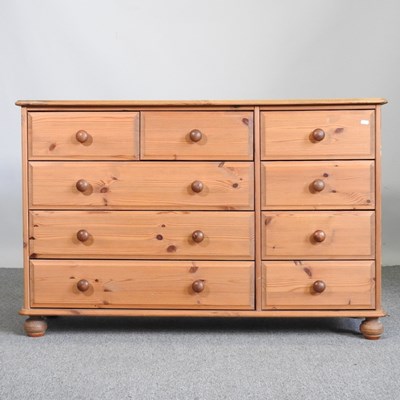 Lot 380 - A modern pine chest, containing an arrangement...