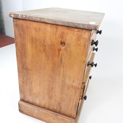 Lot 27 - A Victorian pine miniature chest, containing...