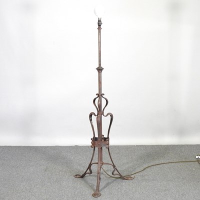 Lot 834 - An Arts and Crafts steel telescopic standard...