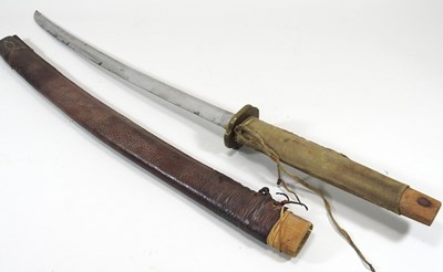 Lot 28 - An early 20th century Japanese sword, with a...