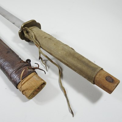 Lot 28 - An early 20th century Japanese sword, with a...