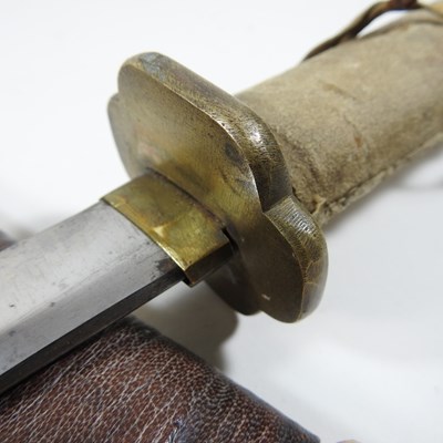 Lot 28 - An early 20th century Japanese sword, with a...