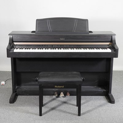 Lot 798 - A Roland digital piano, HP107e, 141cm wide,...