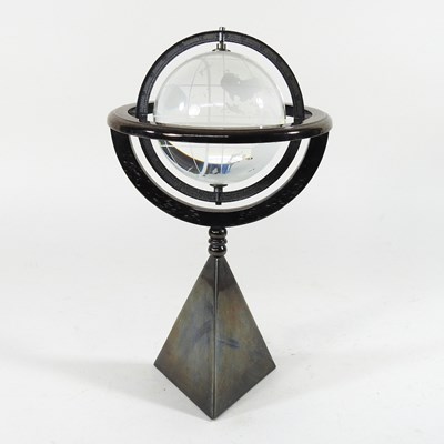 Lot 794 - A glass armillary sphere, on a weighted stand,...