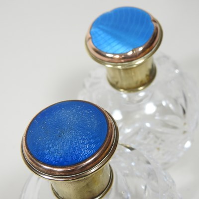 Lot 30 - A cut glass scent bottle, with a gilt and blue...