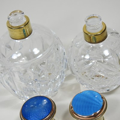 Lot 30 - A cut glass scent bottle, with a gilt and blue...