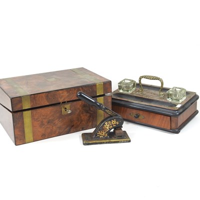Lot 770 - A Victorian walnut and brass bound writing...