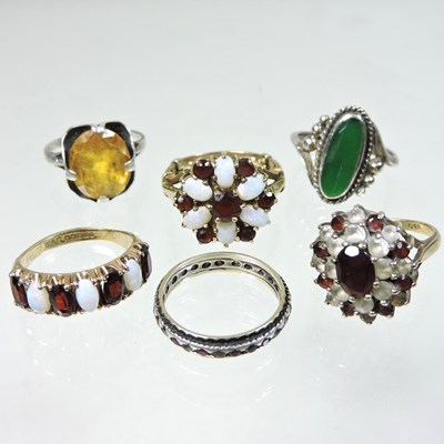 Lot 14 - A 9 carat gold garnet and opal cluster ring