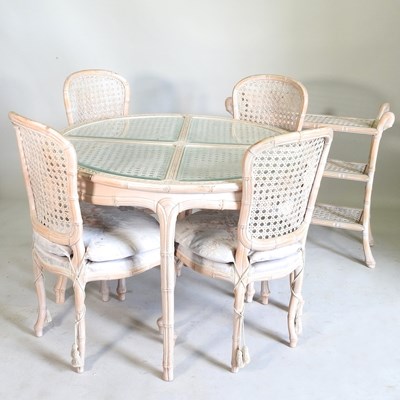 Lot 840 - A carved wood and limed dining table, with a...