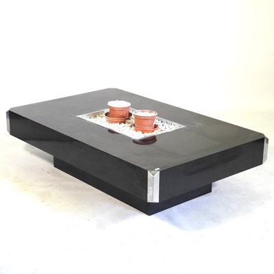 Lot 18 - An Italian black formica Alveo coffee table,...