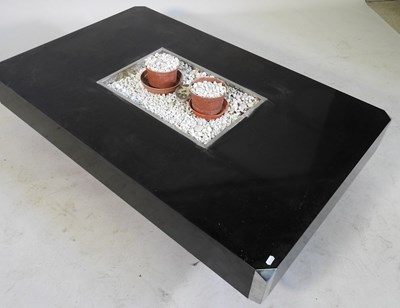 Lot 18 - An Italian black formica Alveo coffee table,...