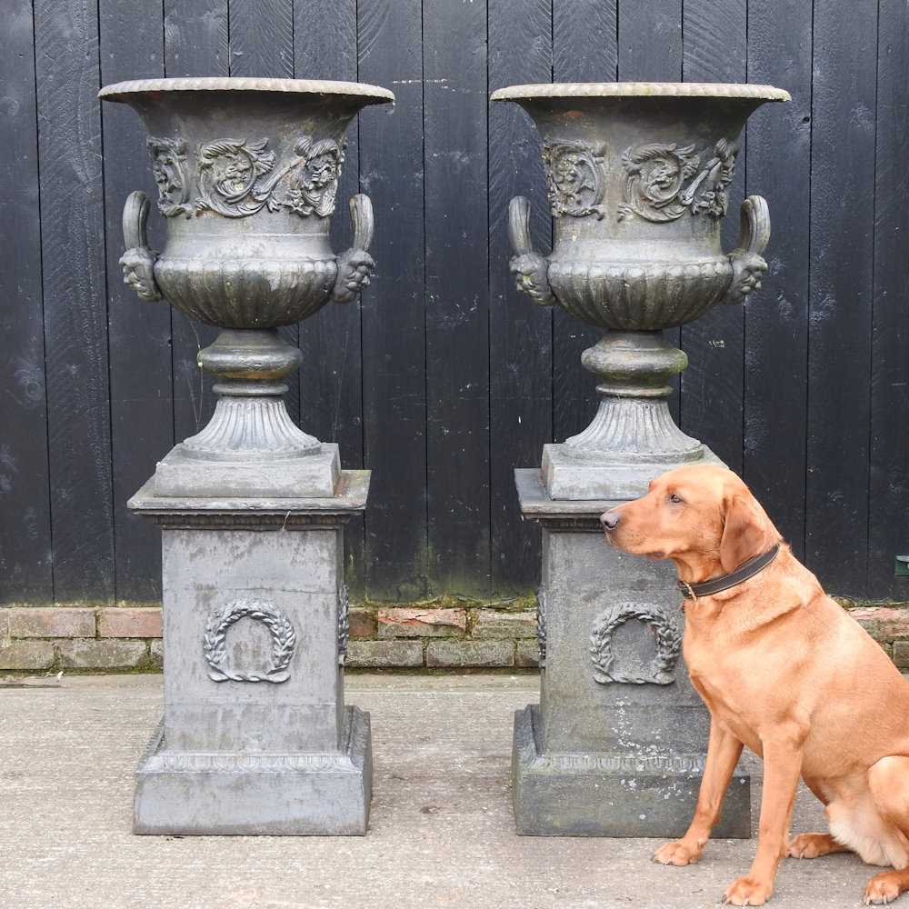 Lot 5 - A pair of impressive black painted cast iron...