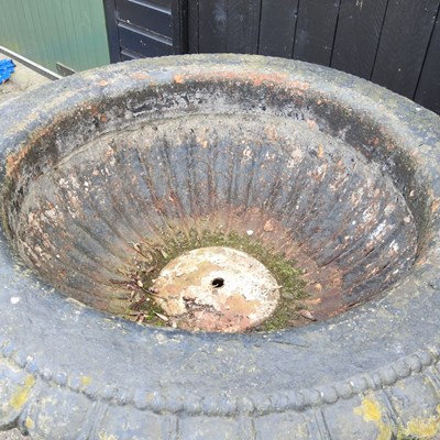 Lot 35 - A large black painted cast iron garden planter,...