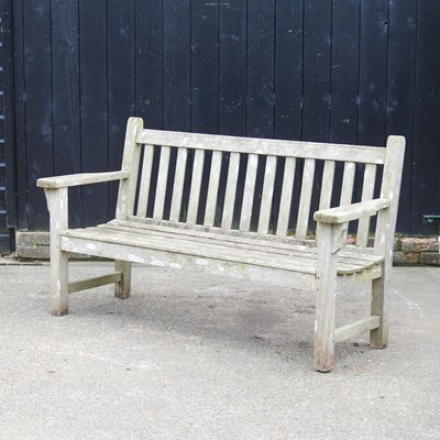Lot 809 - A slatted hardwood garden bench