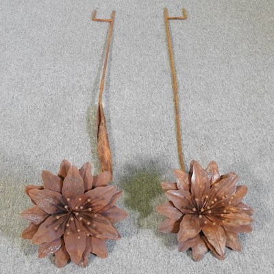 Lot 381 - A rusted flower head plant support, together...