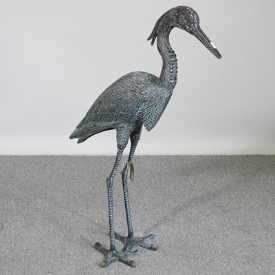 Lot 553 - A metal garden model of a heron, 85cm high