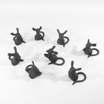 Lot 415 - A collection of eight small metal models of...