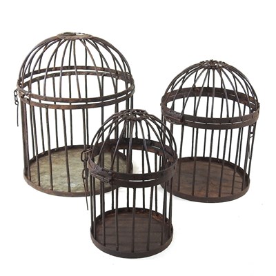 Lot 497 - A set of three graduated metal cages, largest...