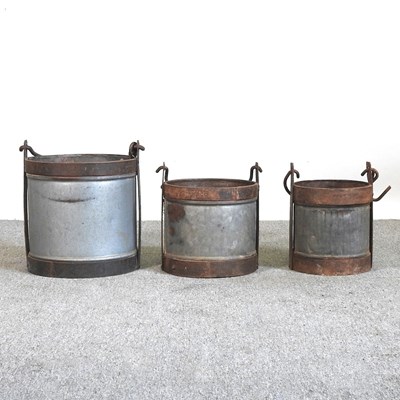 Lot 521 - A set of three milk buckets, highest 37cm