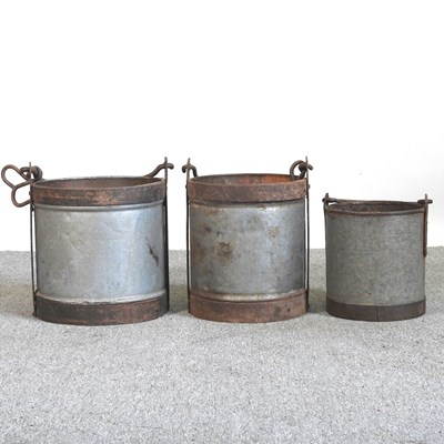 Lot 468 - A set of three milk buckets, highest 37cm