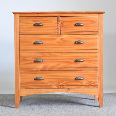 Lot 396 - A modern pine chest of drawers, together with...